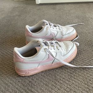 White with pink Nike air forces